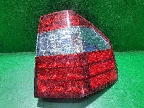 Used OEM Part - Combination Tail Light Assembly compatible with Kia Borrego 2008, genuine OEM replacement part 92402 2J000