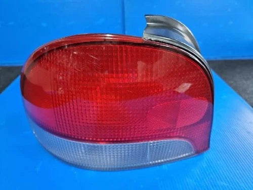 Used OEM Part - Tail light assembly compatible with Hyundai Accent 1999, genuine OEM replacement part 92401 22500