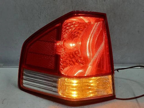 Used OEM Part - Combination Tail Light Assembly compatible with Kia Borrego 2008, genuine OEM replacement part 924012J000